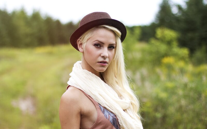 woman in hat and scarf