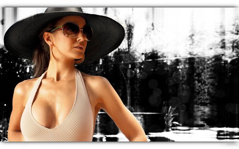 woman in hat and sunglasses