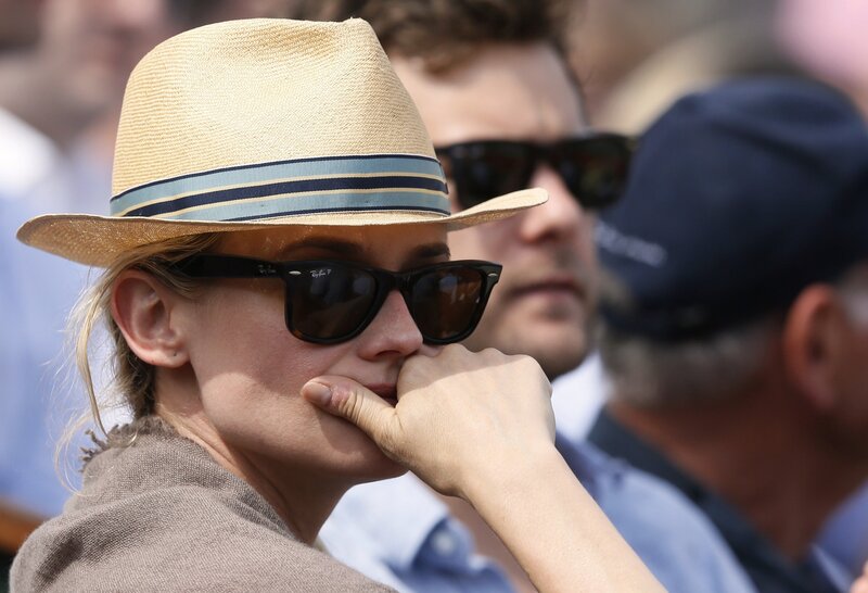 woman in hat and sunglasses