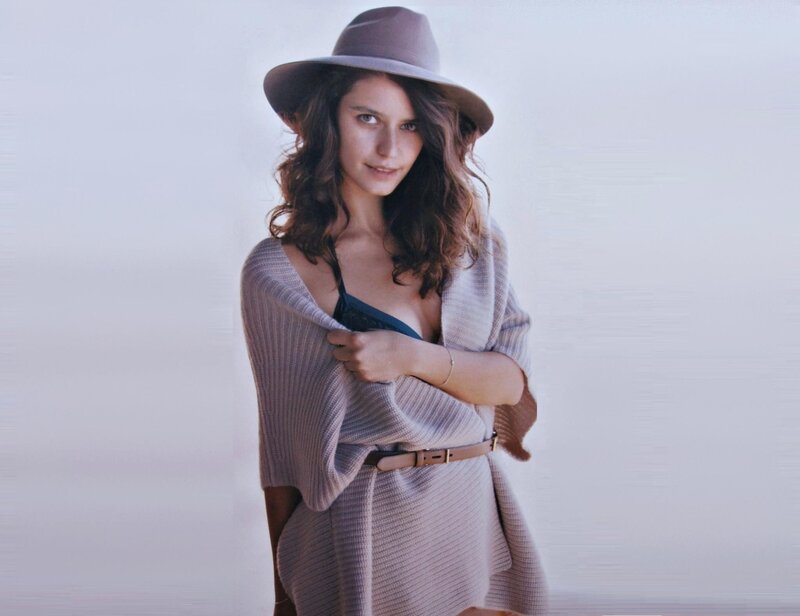 woman in hat and sweater