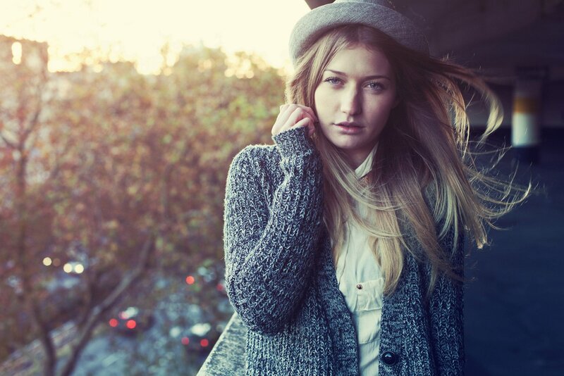 woman in hat and sweater