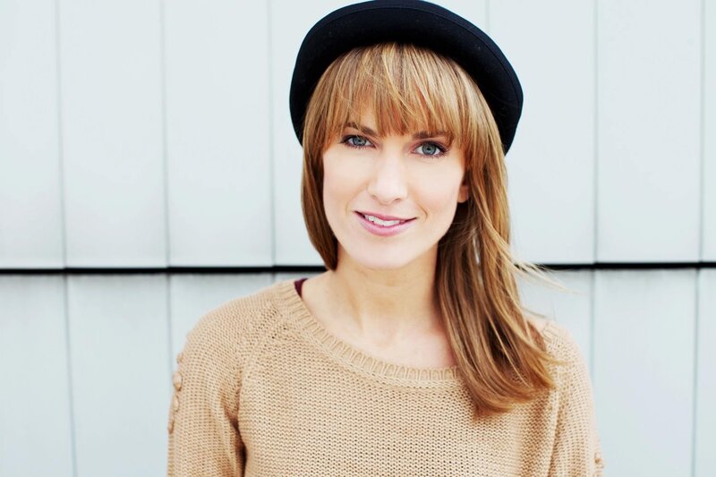 woman in hat and sweater
