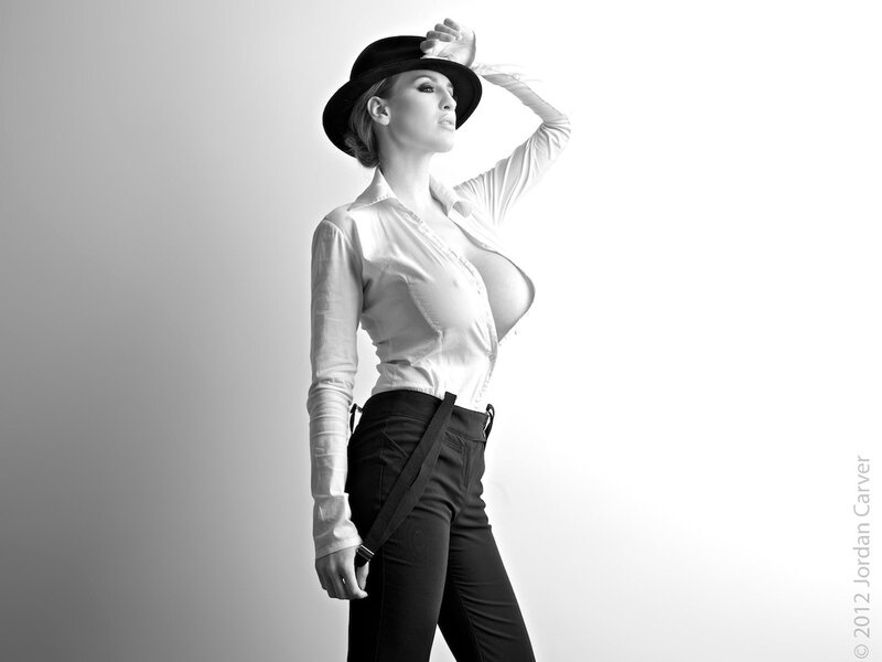 woman in hat and white shirt