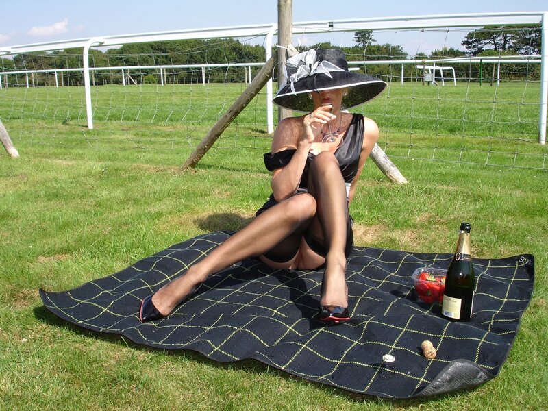 Woman in hat at picnic