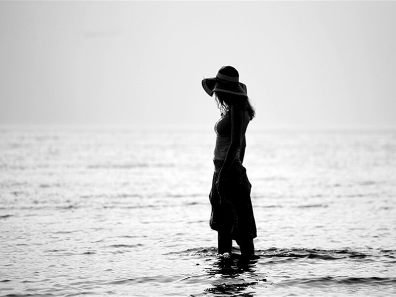Woman in Hat at Sea