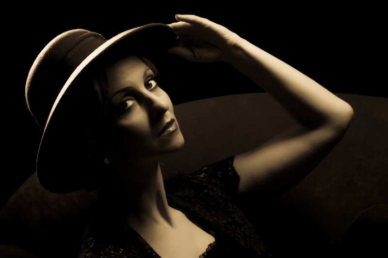 Woman in Hat — Black, Dramatic, Night, Photograph