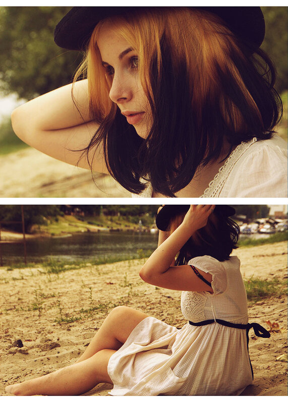 woman in hat by the river