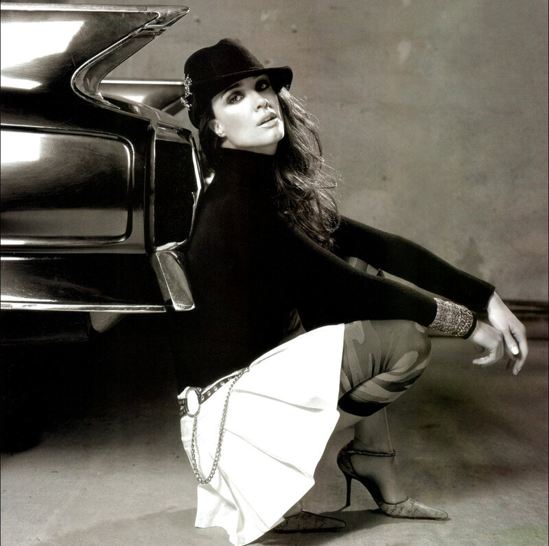 Woman in Hat Crouching