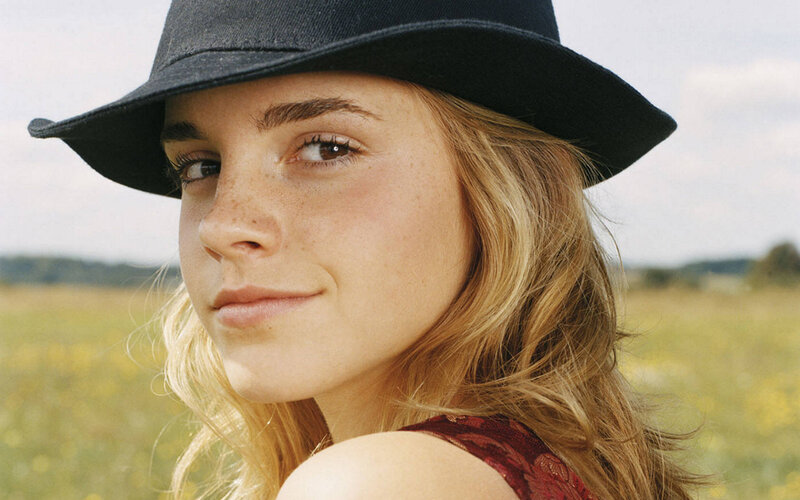woman in hat in field