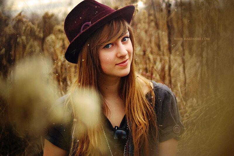 woman in hat in field