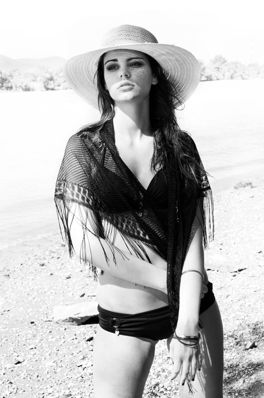 woman in hat on beach