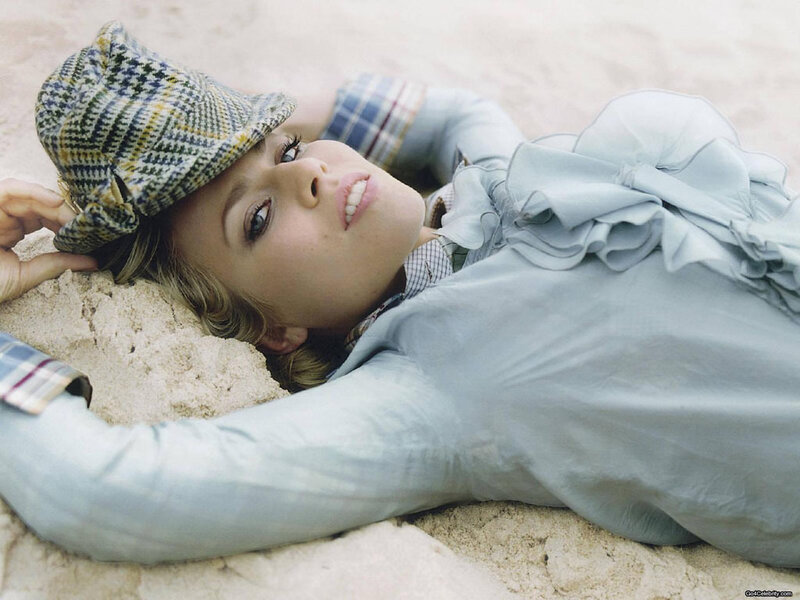 woman in hat on beach