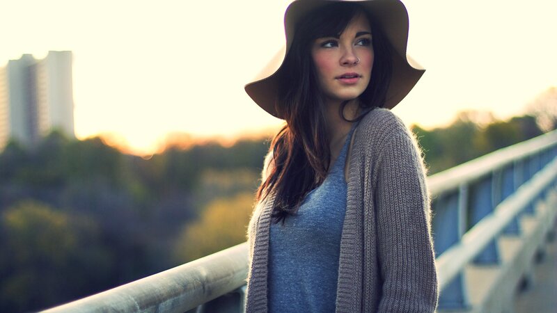 Woman in Hat on Bridge — Gray