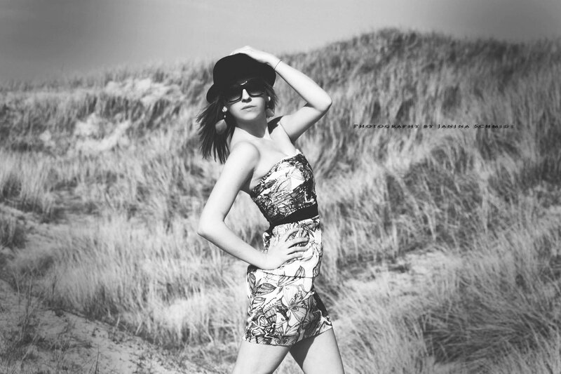 Woman in hat on dunes