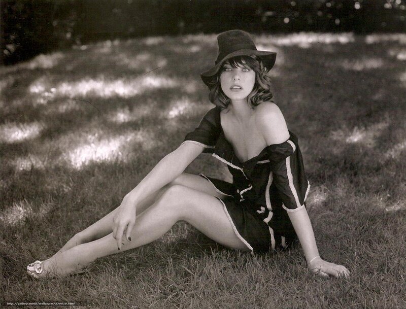 Woman in hat on grass