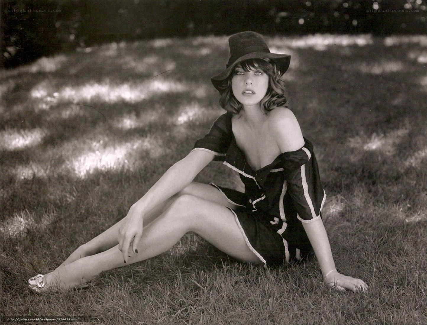 Woman in hat on grass