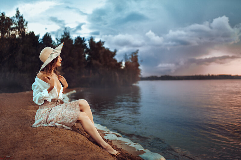 Woman in Hat on Shore