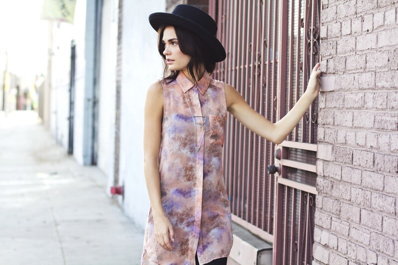 woman in hat on street