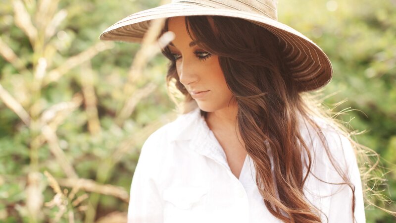 woman in hat outdoors