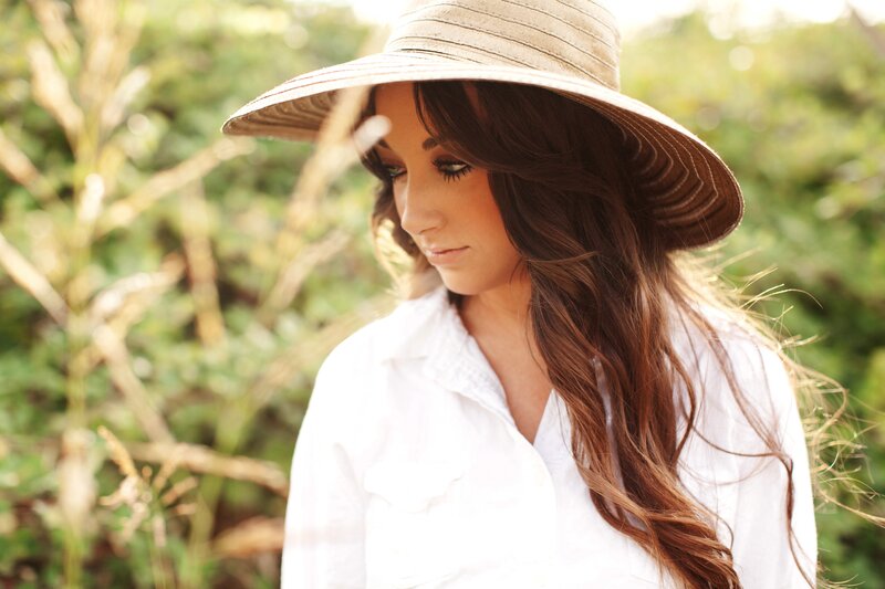 woman in hat outdoors