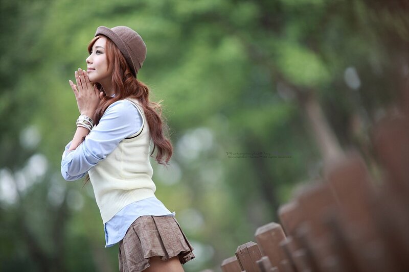 woman in hat outdoors