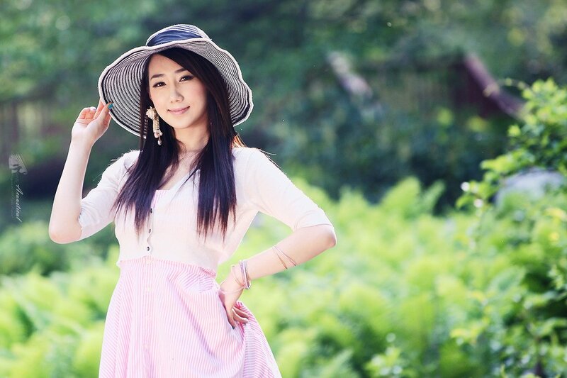 Woman in hat outdoors