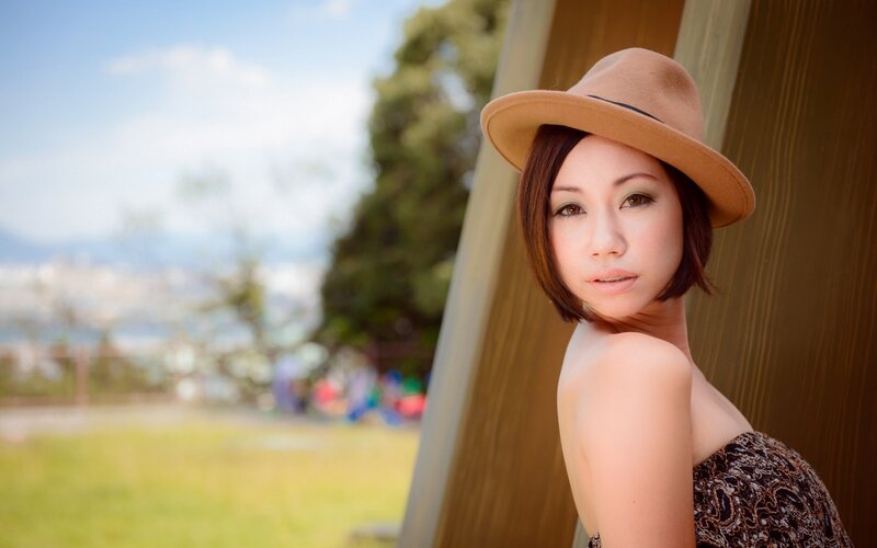 woman in hat outdoors