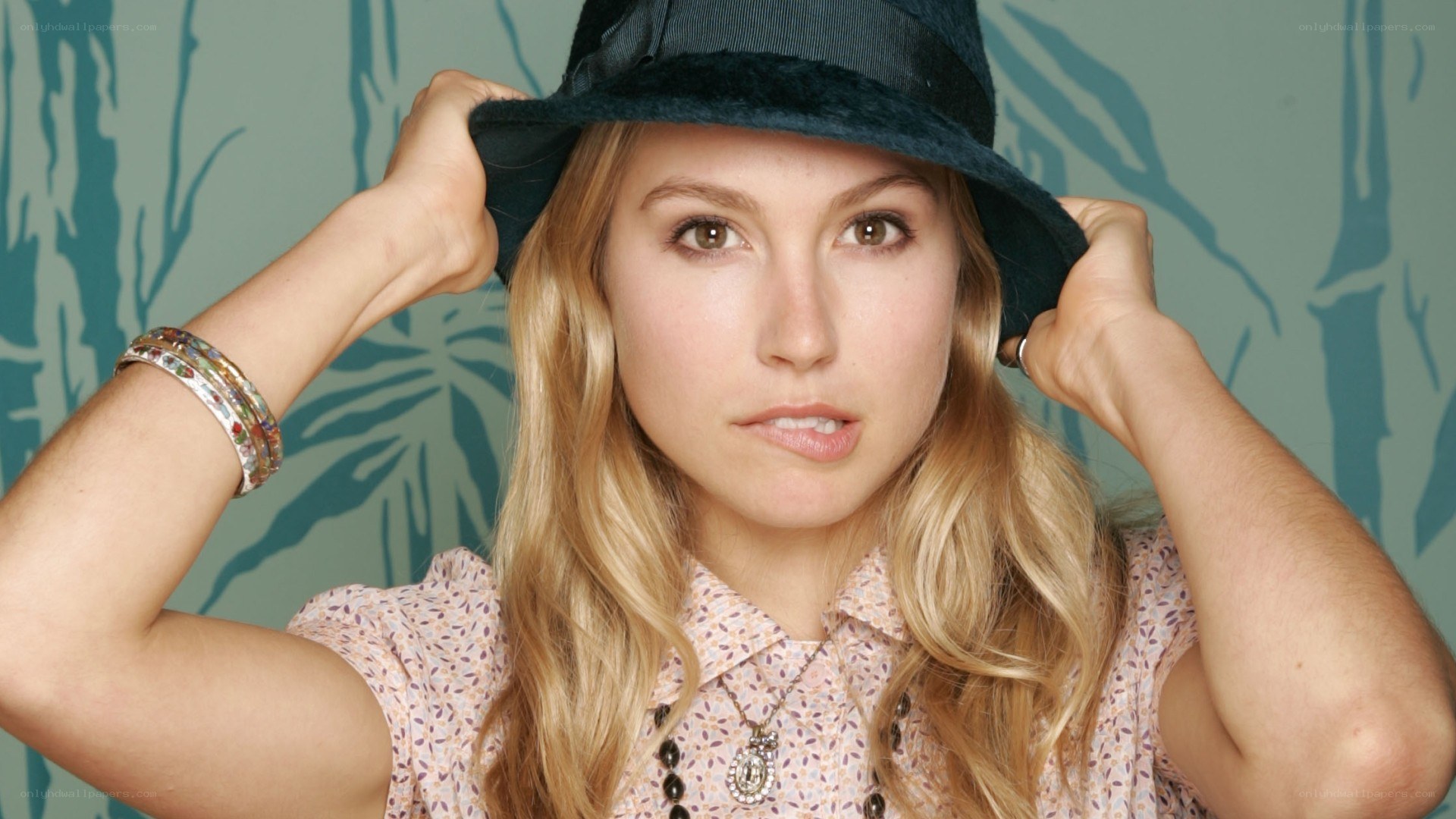 woman in hat posing