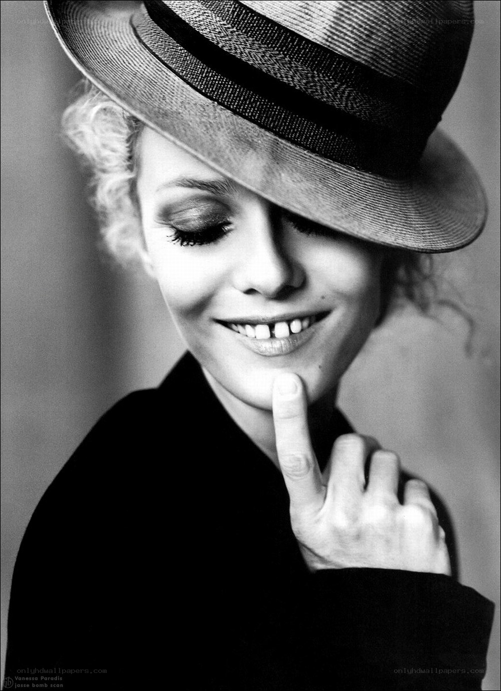 woman in hat smiling