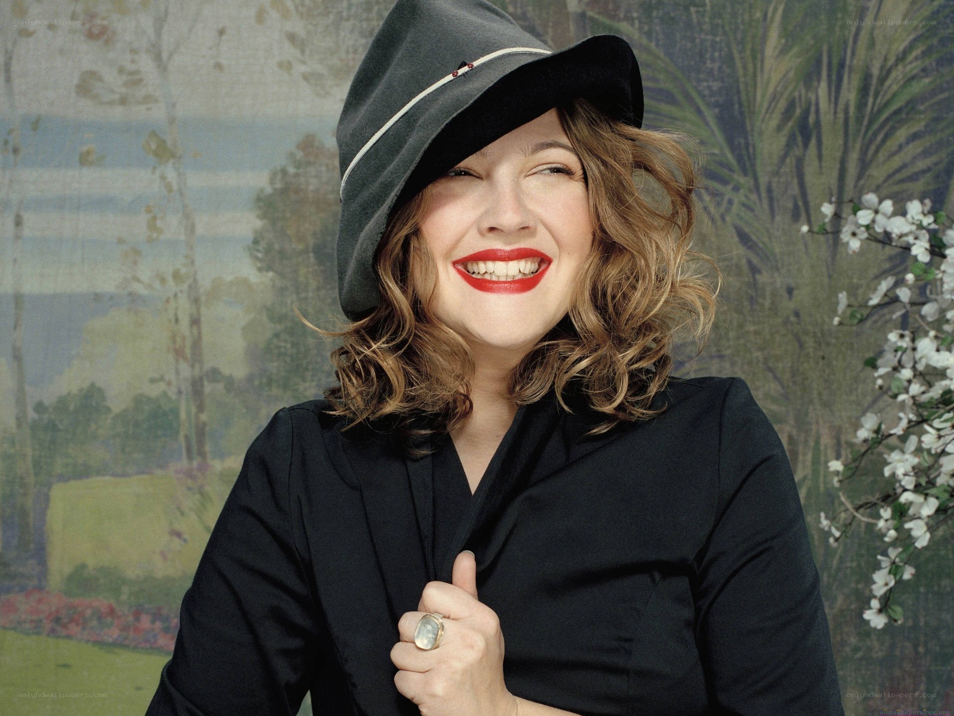 woman in hat smiling