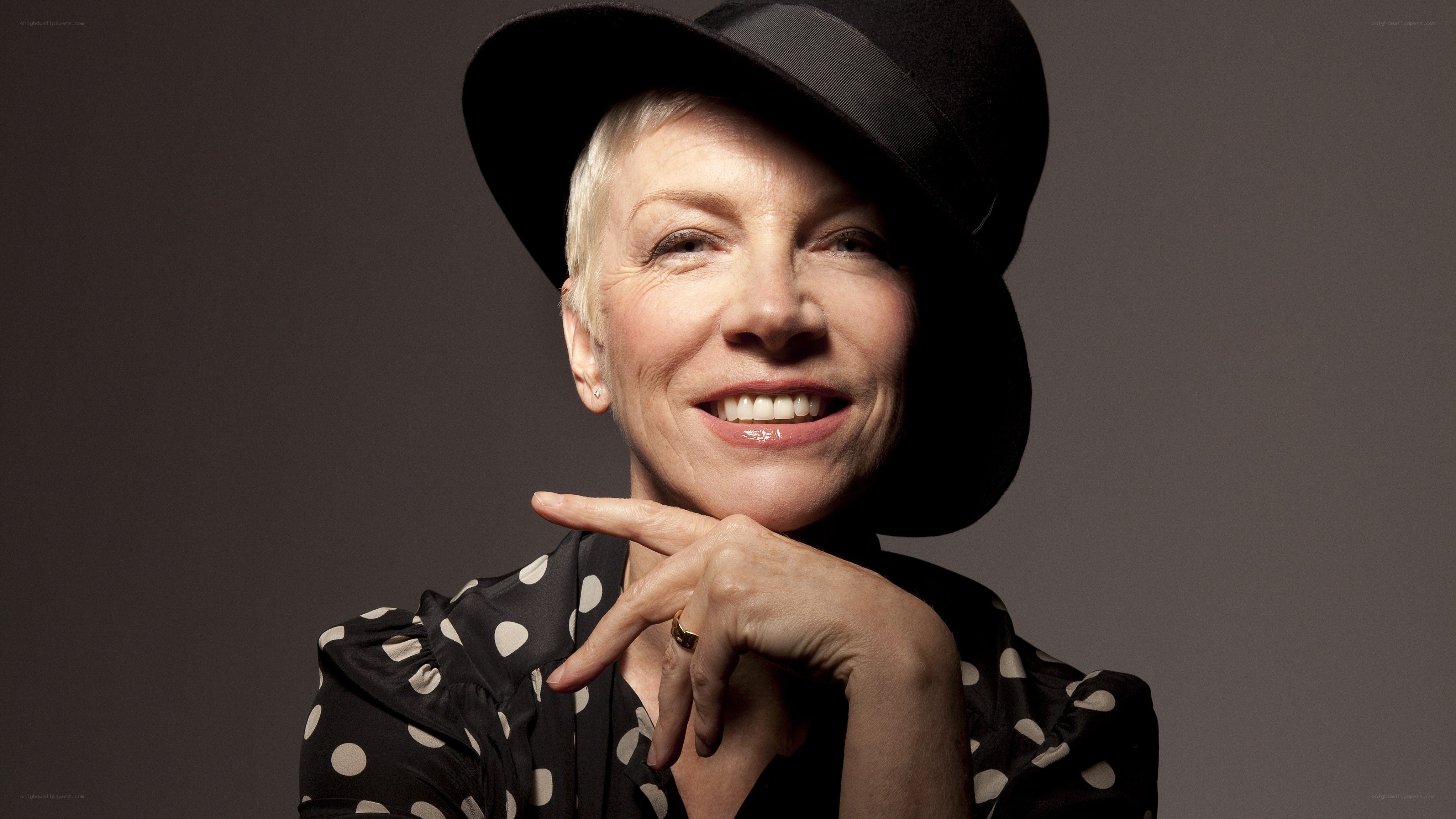 woman in hat smiling