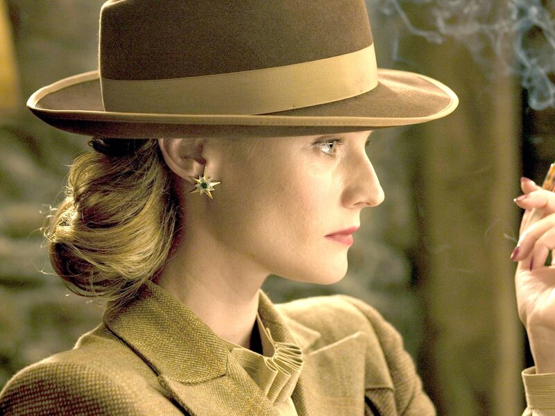 woman in hat smoking cigarette