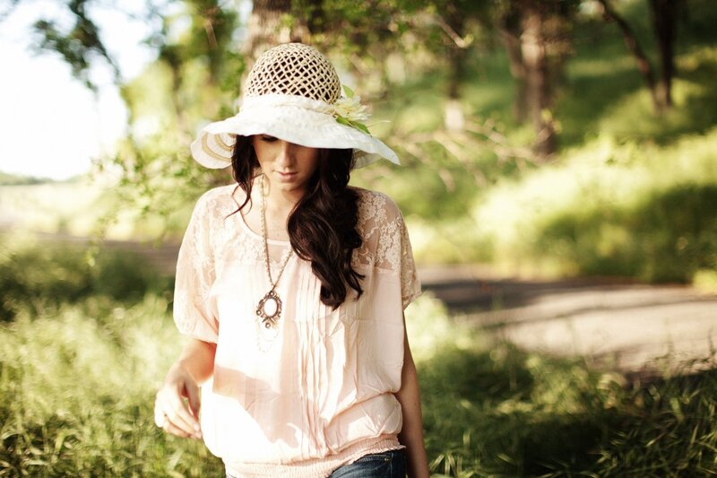 woman in hat walking outdoors