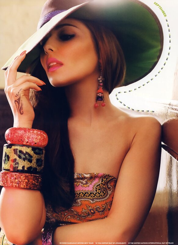 woman in hat with colorful bracelets