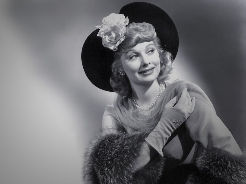 woman in hat with flower