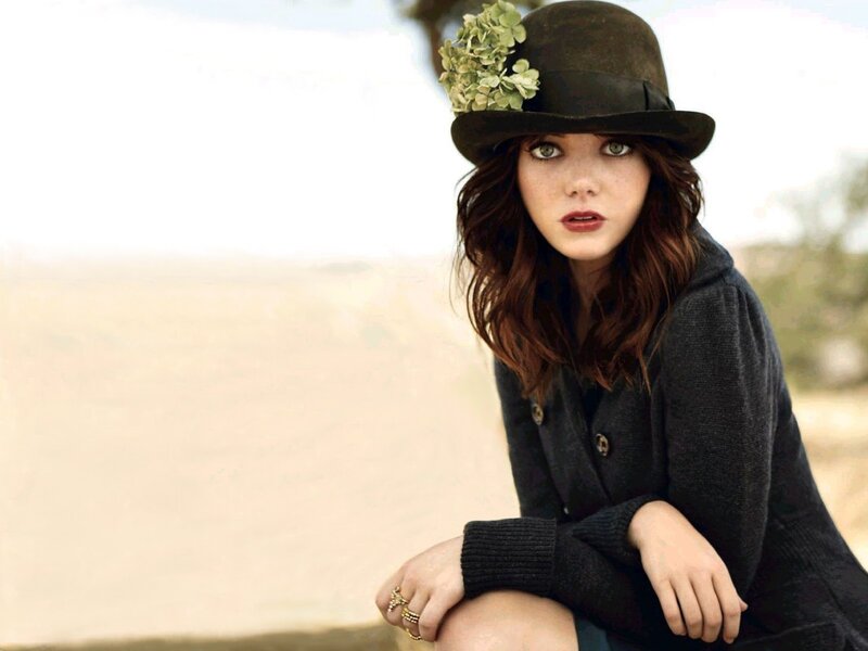 woman in hat with flowers