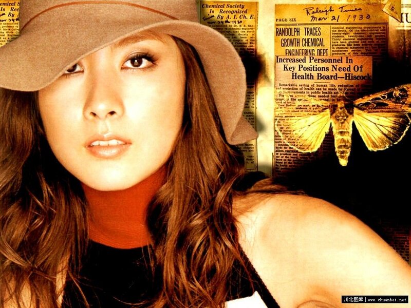 woman in hat with newspaper collage