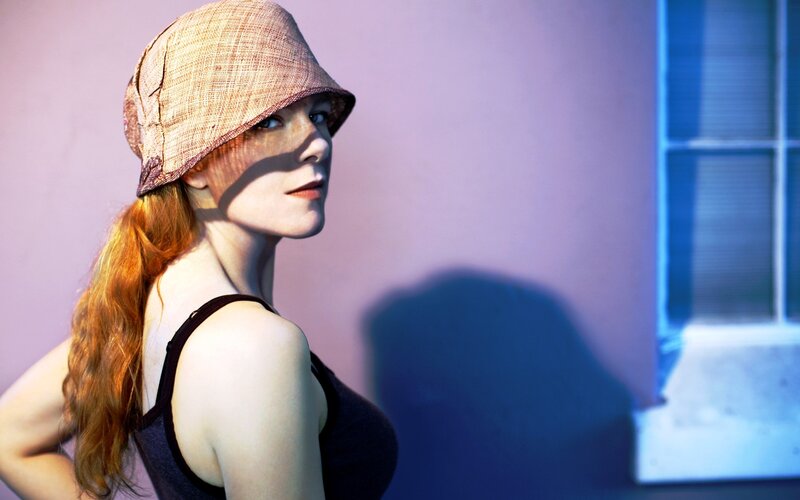woman in hat with red hair