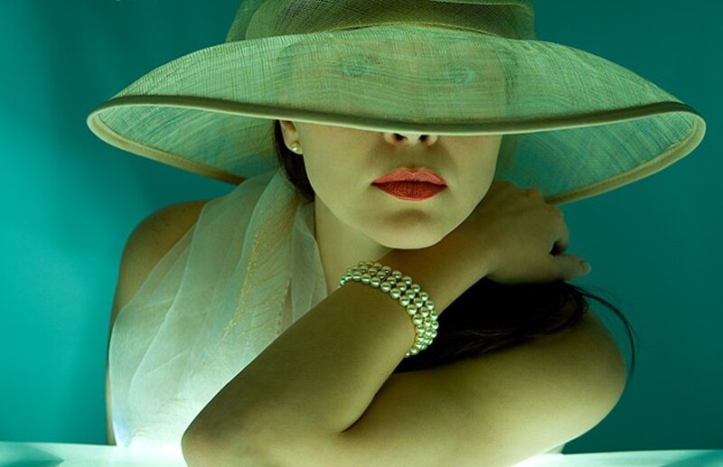 woman in hat with red lips