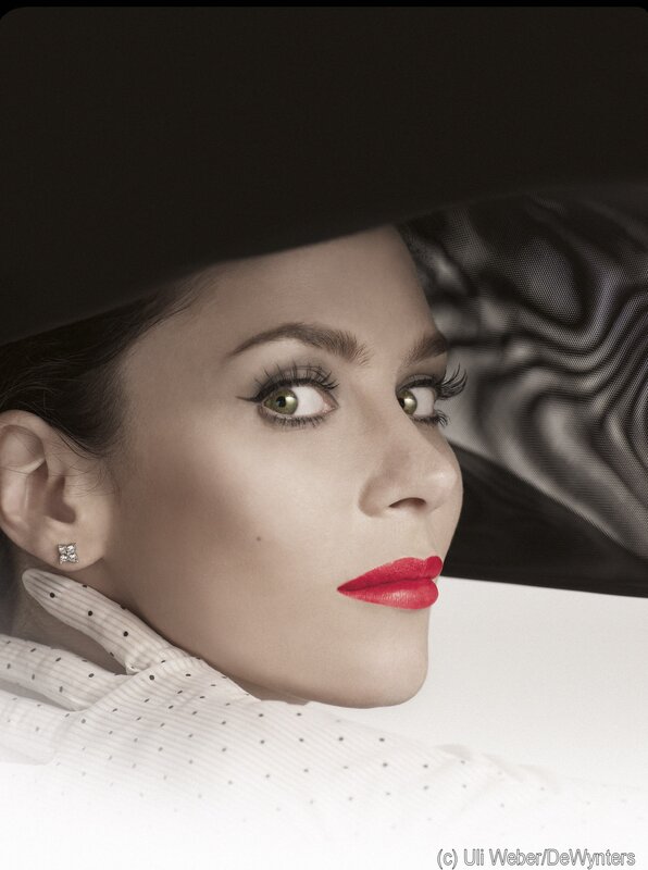woman in hat with red lipstick