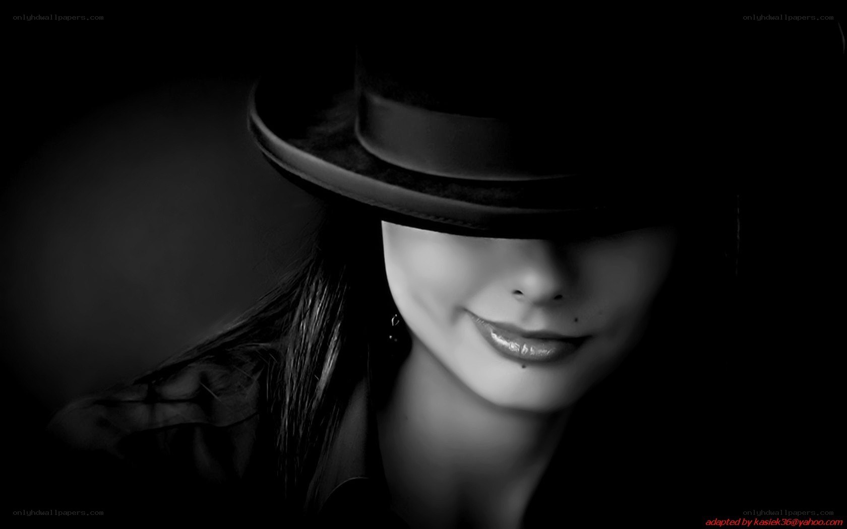 woman in hat with smile