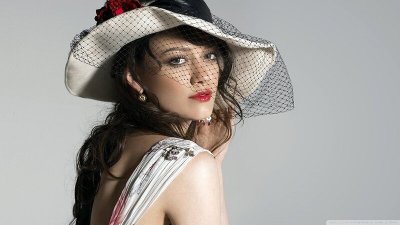 woman in hat with veil