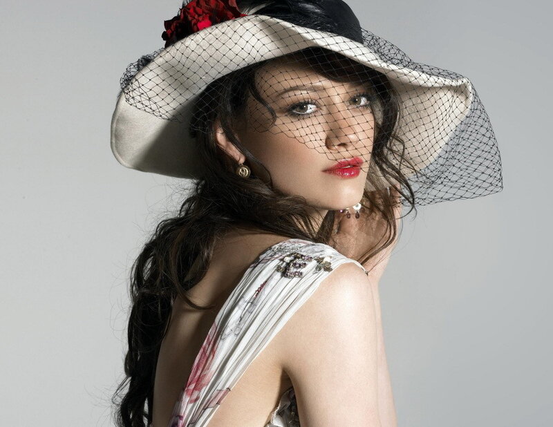 woman in hat with veil