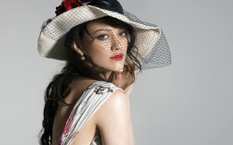 woman in hat with veil