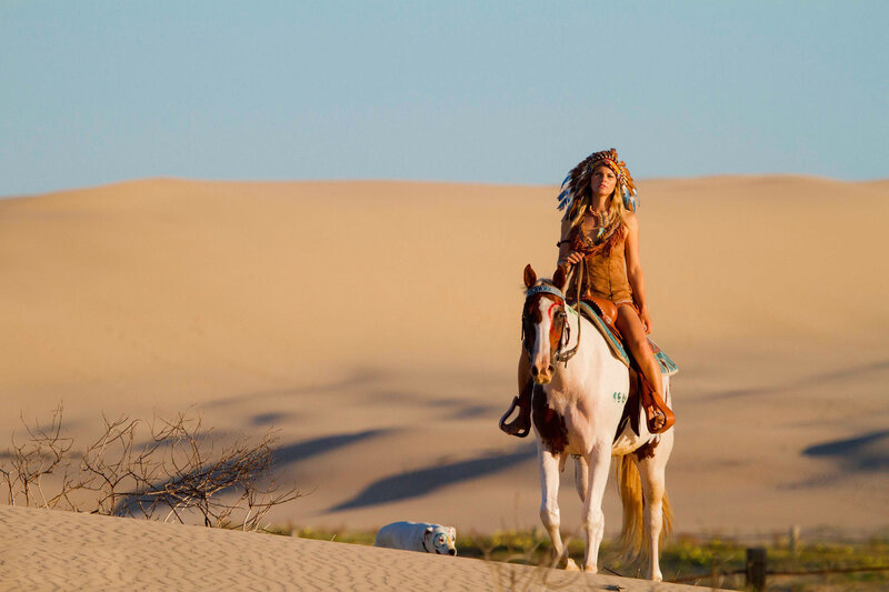 Woman in Headdress on Horse