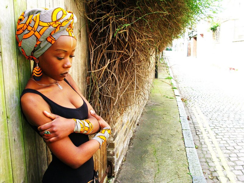 Woman in Headwrap Leaning