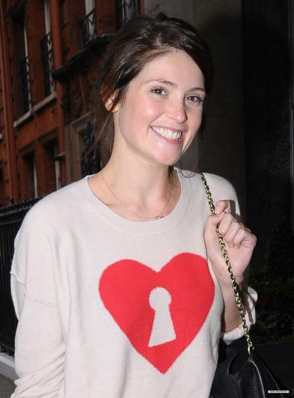 woman in heart sweater