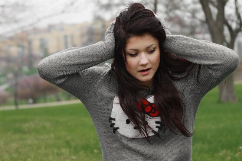 woman in hello kitty sweater