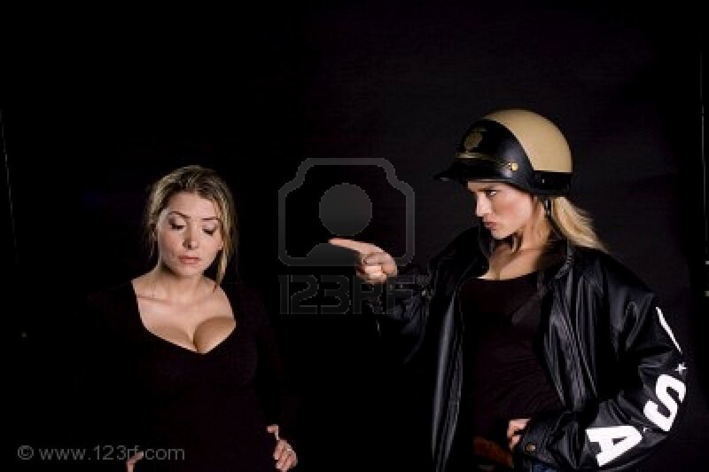 Woman in Helmet Pointing