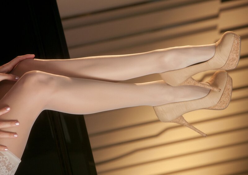 woman in high heels and stockings